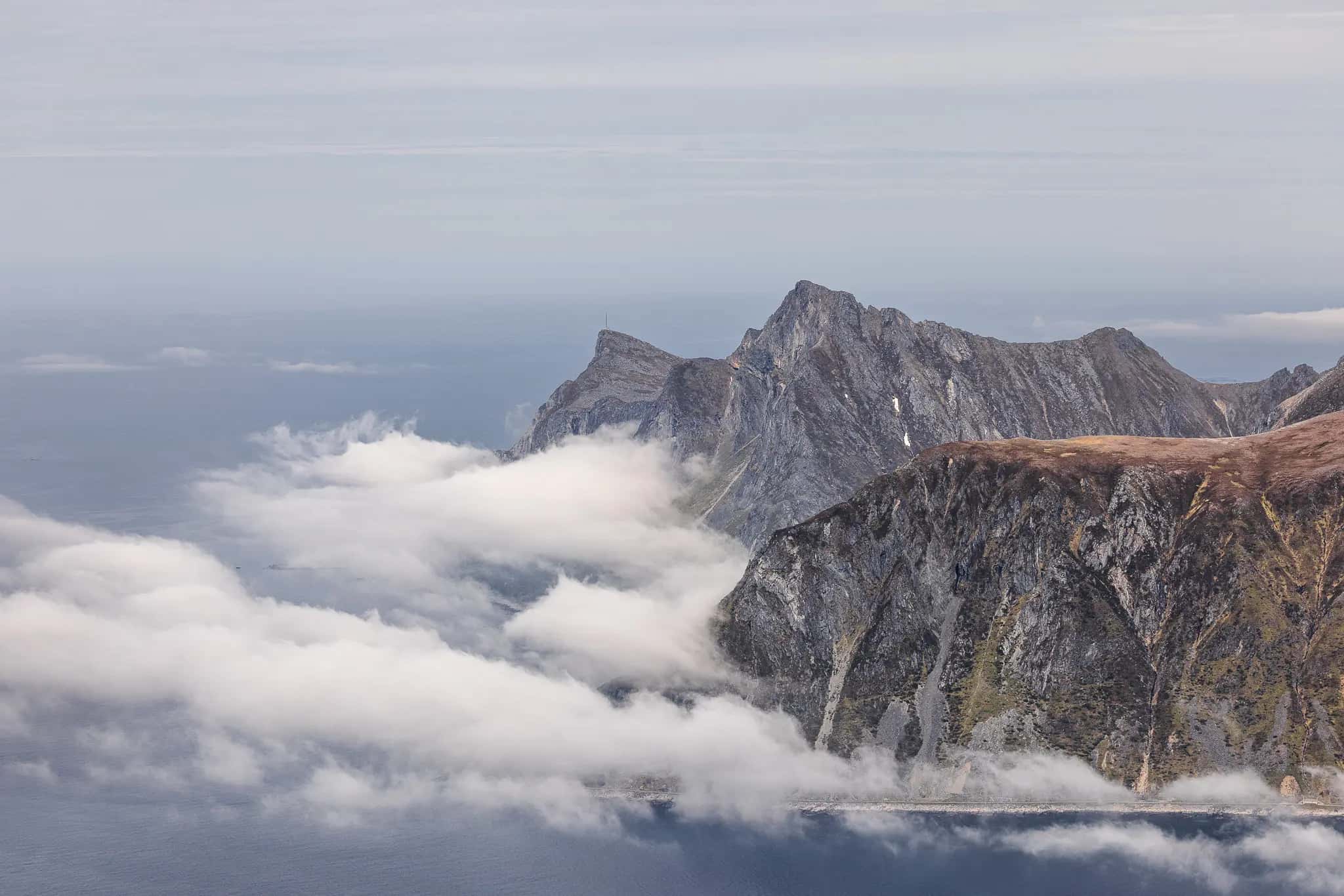 Cloud plays around the rugged coastline of the Lofoten Islands