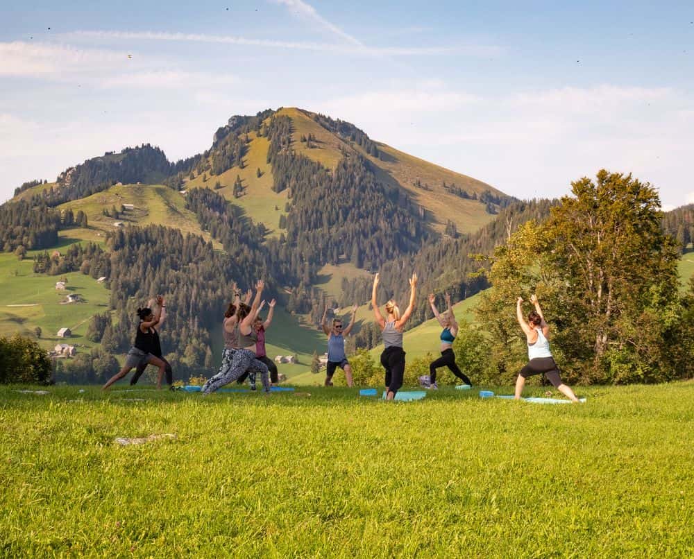 Alpine yoga: depending on the weather, we use the hotel's yoga room or go out into the Engadine countryside