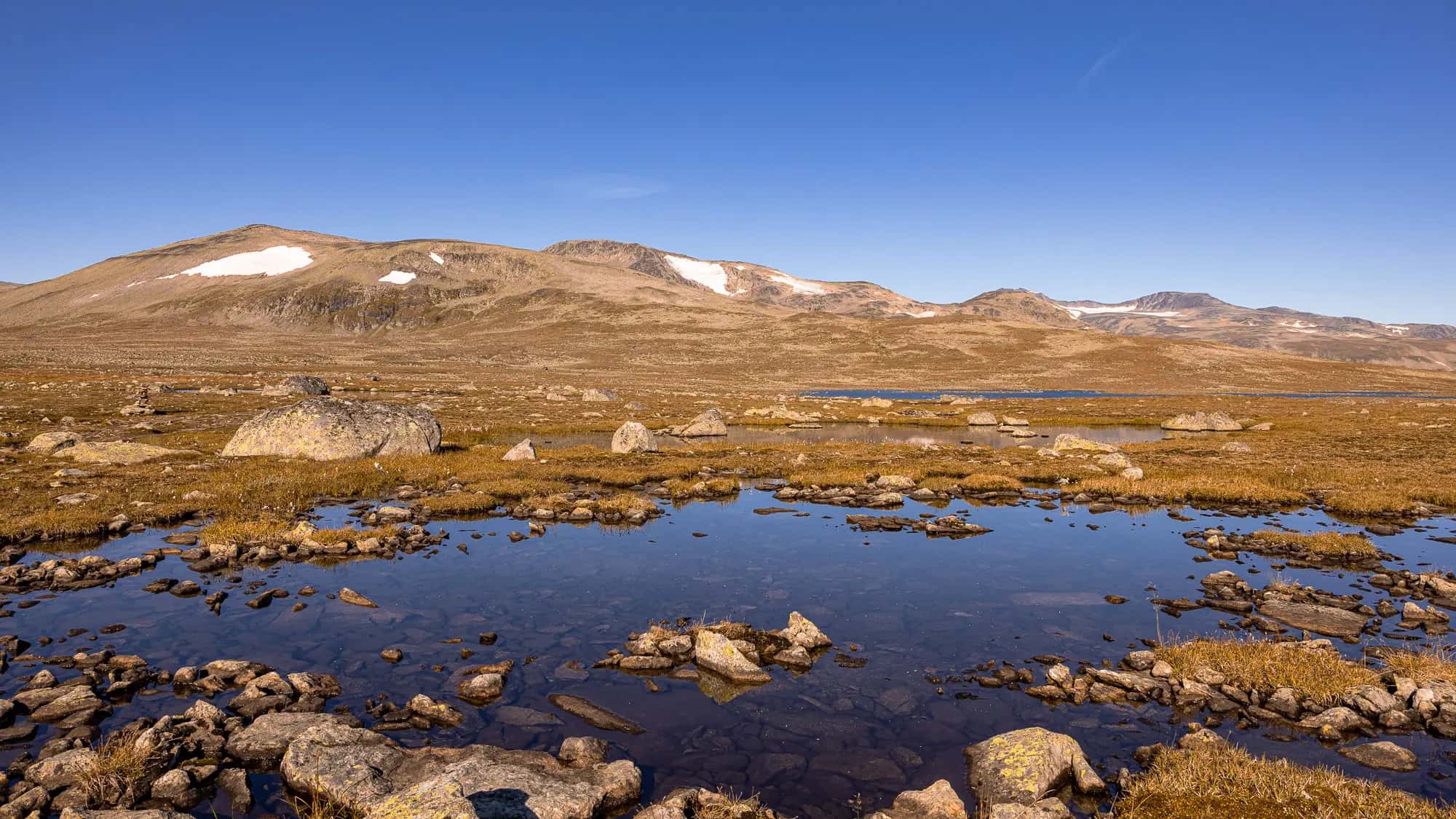 From now on there's only rock, water and sparse vegetation