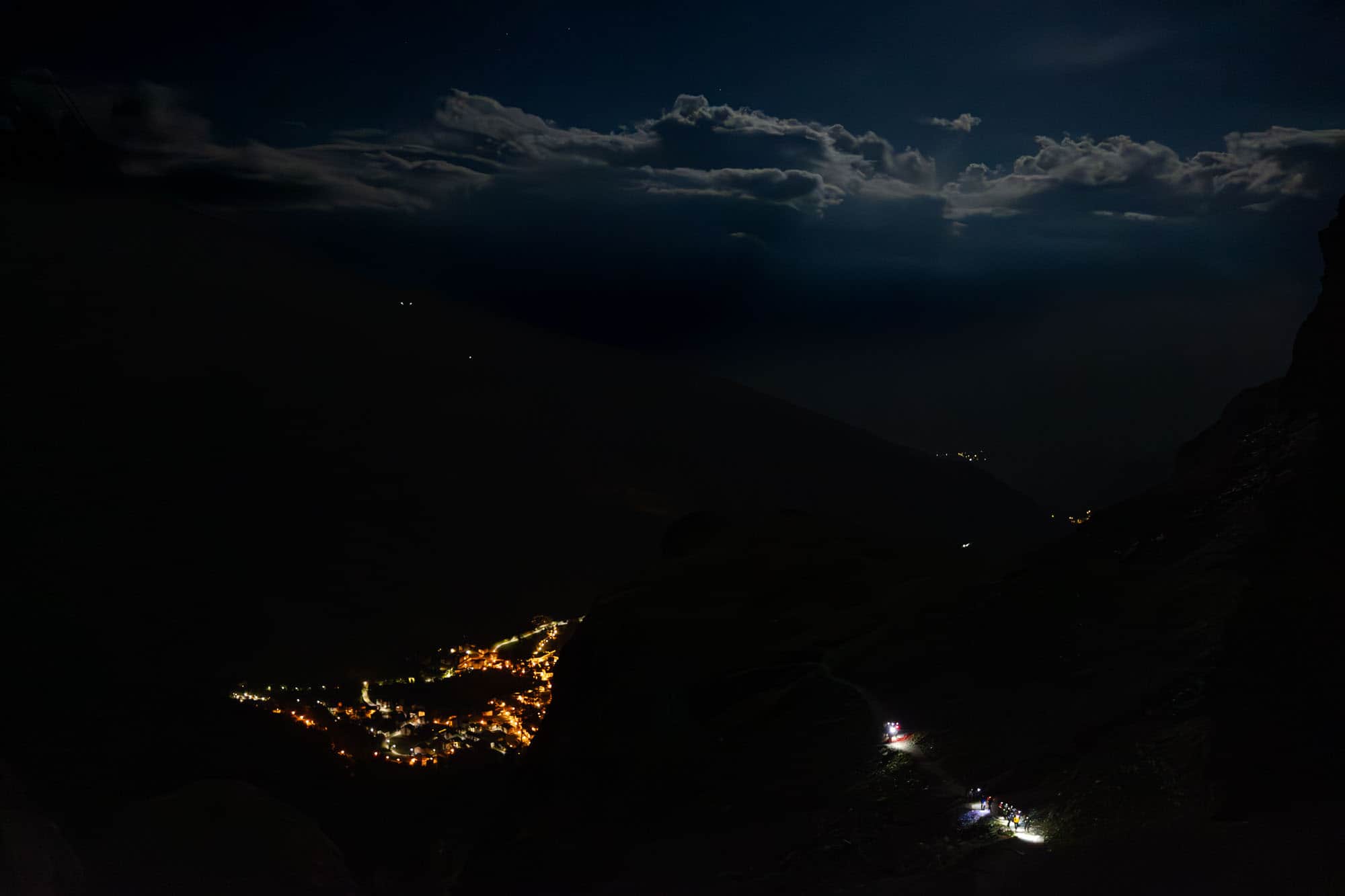 Small lights in a vast mountain world